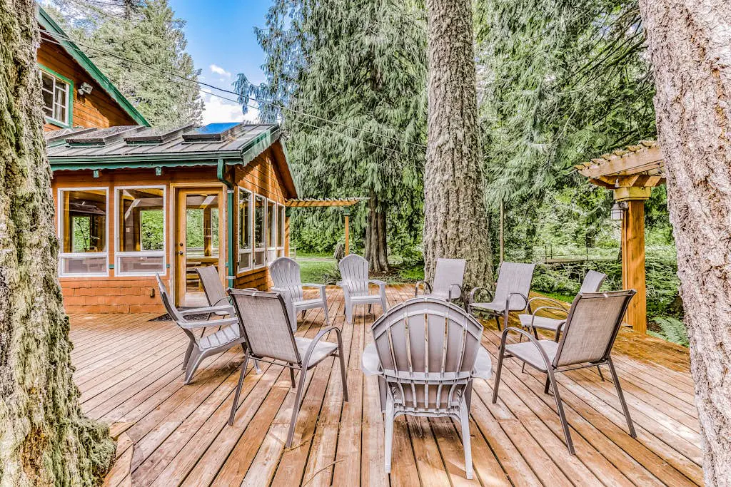 Dog-friendly creekside home with entertainment barn, private hot tub & firepit