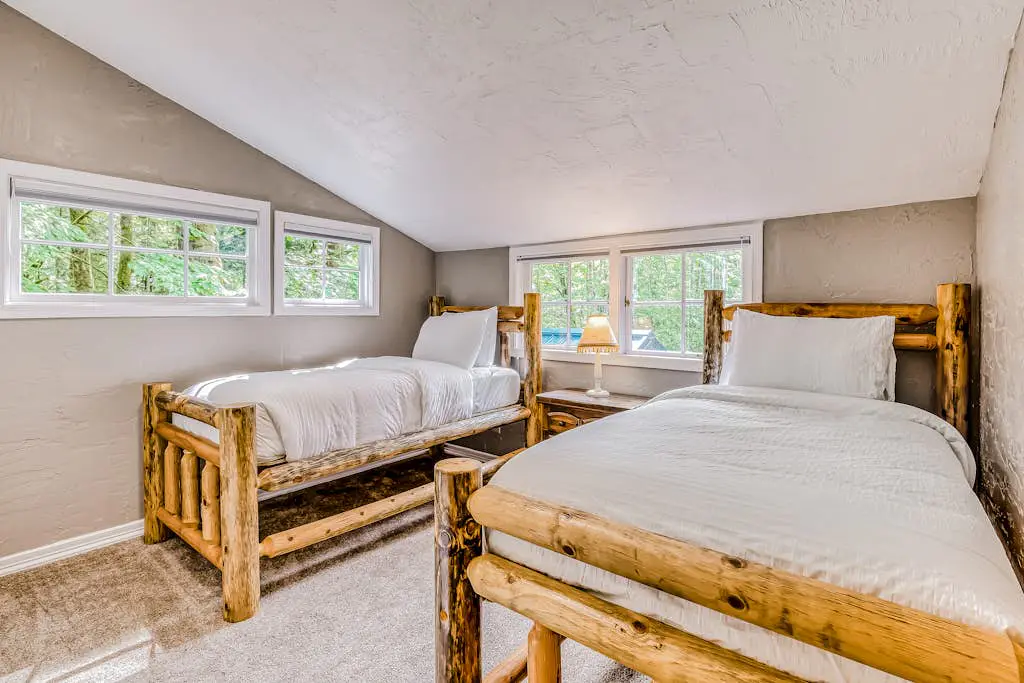 Dog-friendly creekside home with entertainment barn, private hot tub & firepit