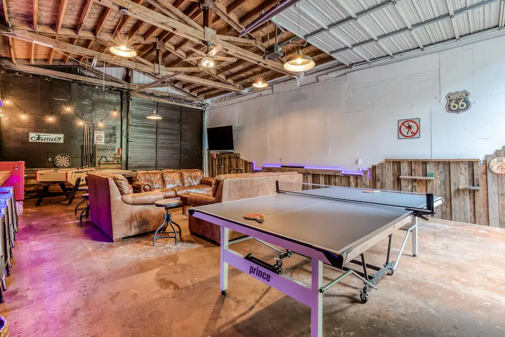 Dog-friendly creekside home with entertainment barn, private hot tub & firepit
