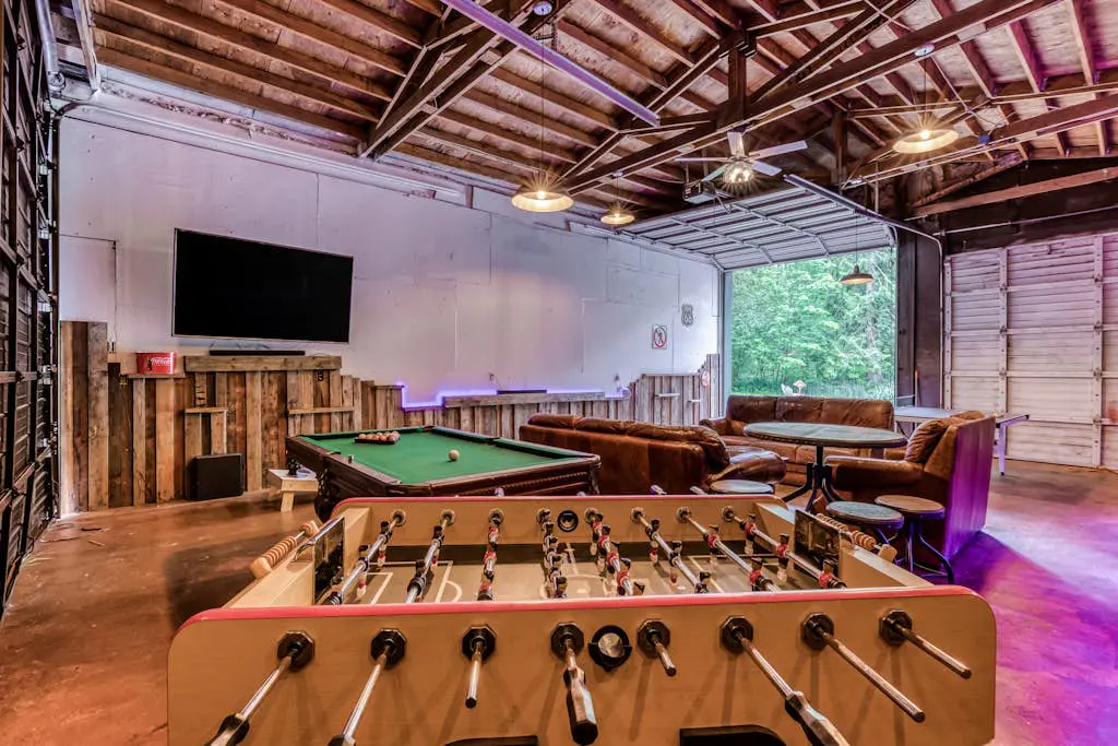 Dog-friendly creekside home with entertainment barn, private hot tub & firepit