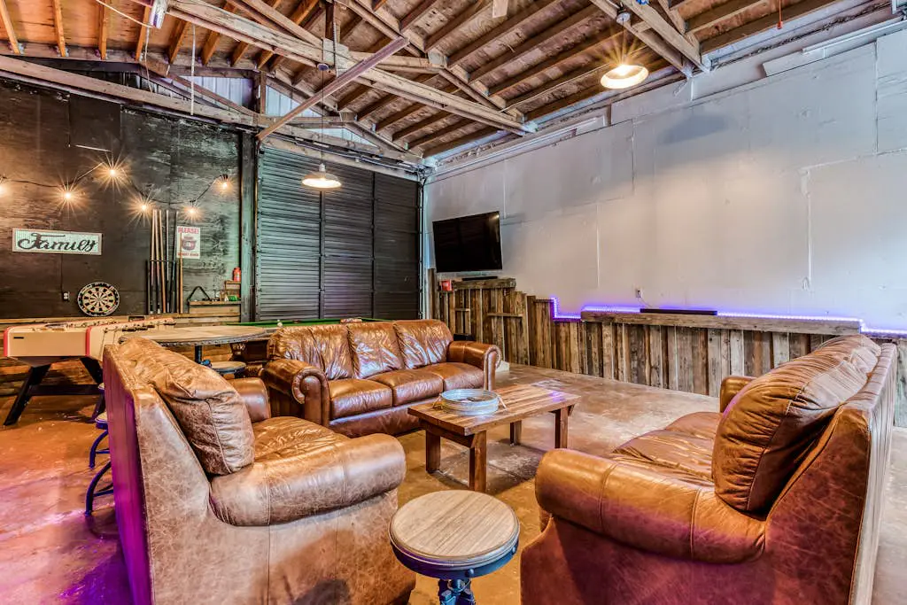 Dog-friendly creekside home with entertainment barn, private hot tub & firepit