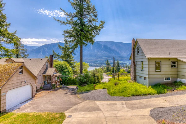 Mountain and river-view home + studio with fireplace, grills, outdoor areas