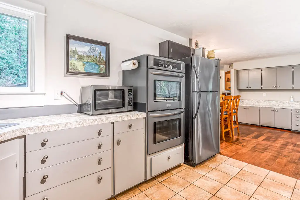 Remodeled home with large yard & kitchen in lovely forest setting - dog-friendly
