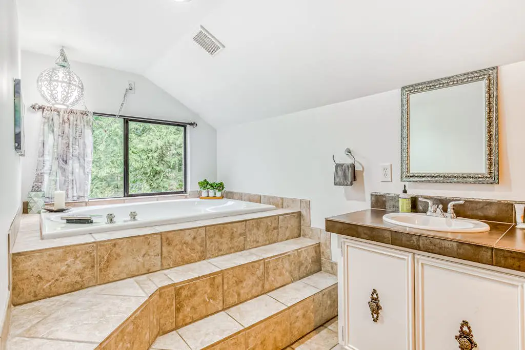 Remodeled home with large yard & kitchen in lovely forest setting - dog-friendly