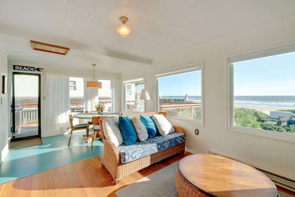 3-story dog-friendly beachfront home with wood stove, gas grill, deck & views