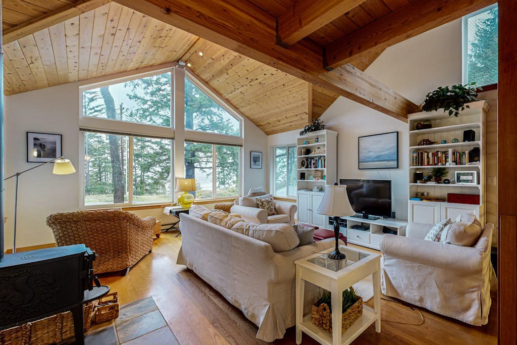 Spacious 3-story home near the beach with water views, grill, deck, & firepit