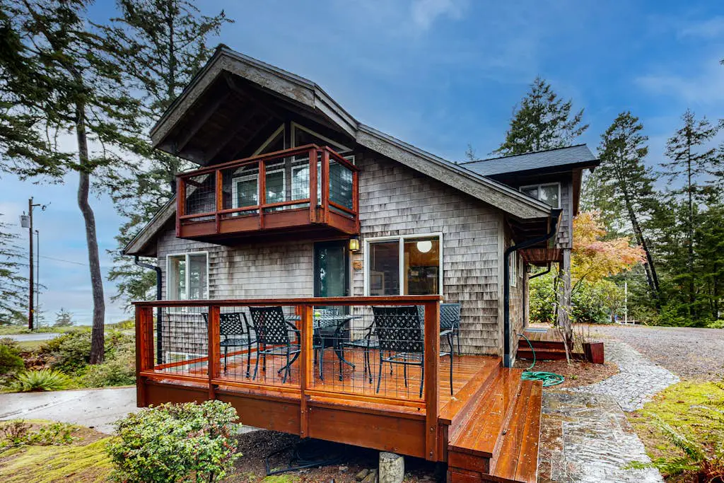 Spacious 3-story home near the beach with water views, grill, deck, & firepit