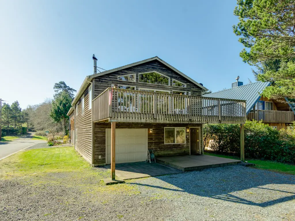 2-story dog-friendly home with beach access, Ping-Pong table, & grill