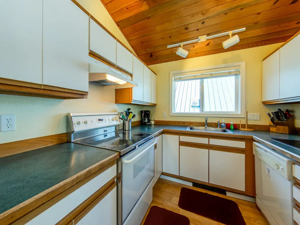 2-story dog-friendly home with beach access, Ping-Pong table, & grill
