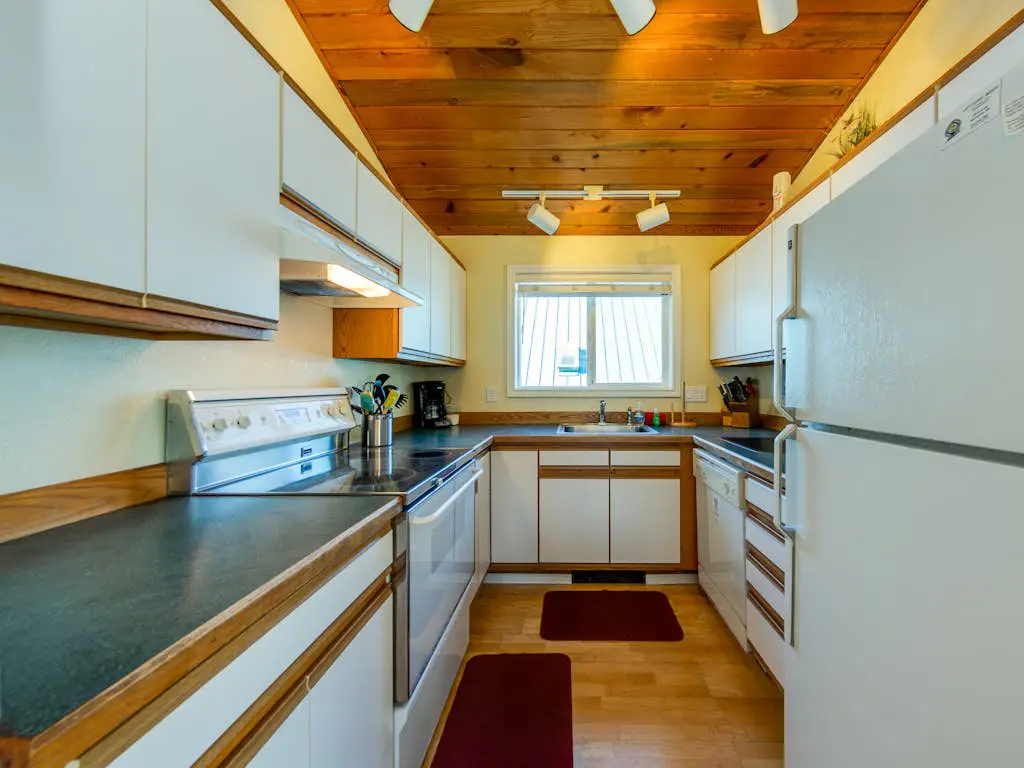 2-story dog-friendly home with beach access, Ping-Pong table, & grill