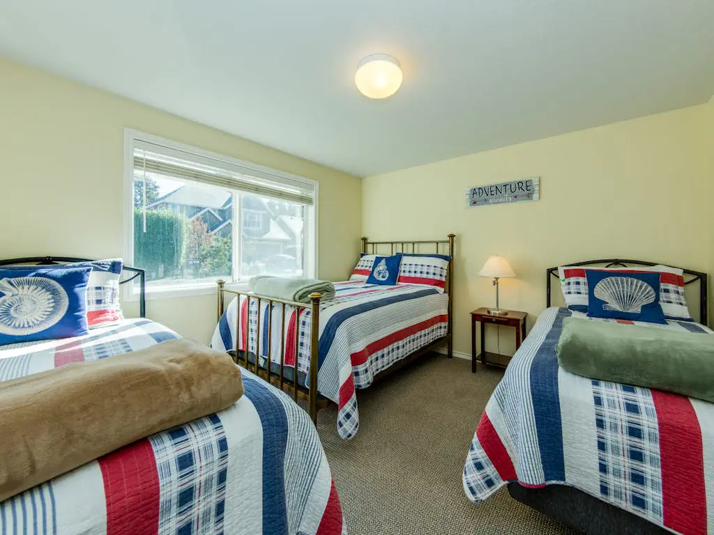 2-story dog-friendly home with beach access, Ping-Pong table, & grill