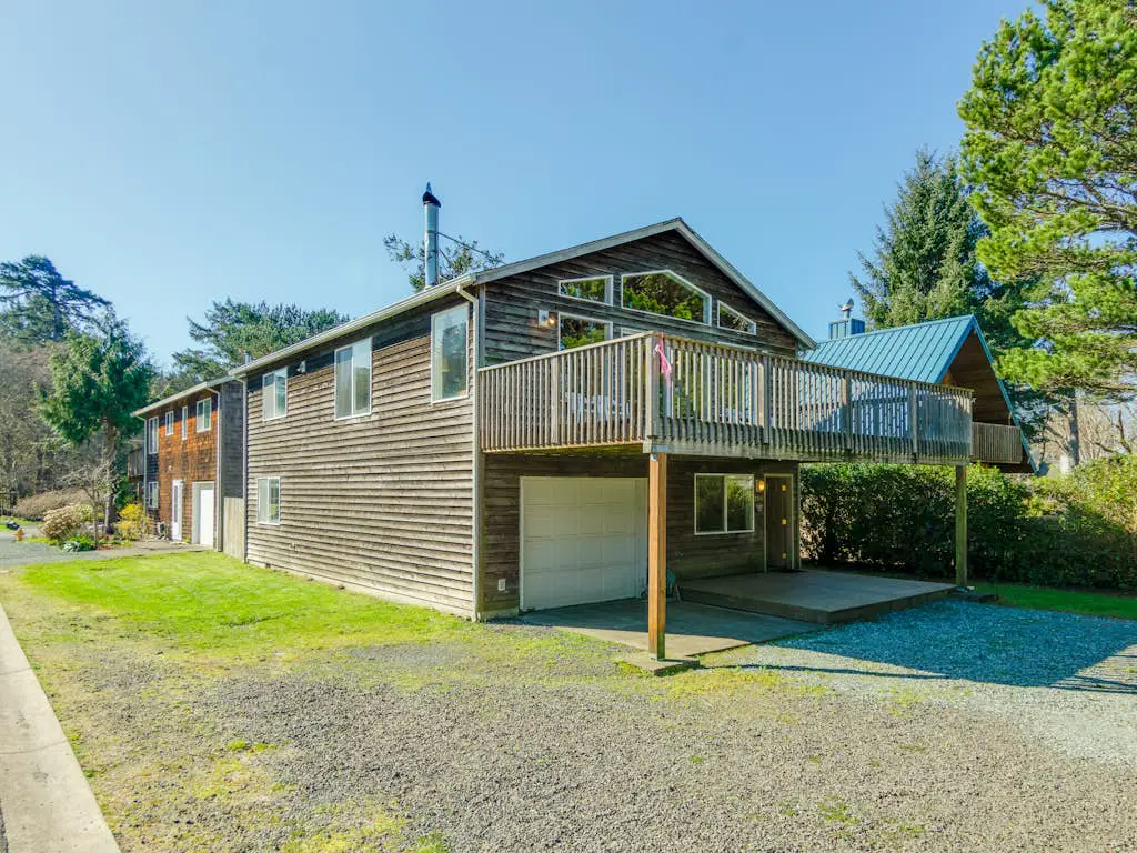 2-story dog-friendly home with beach access, Ping-Pong table, & grill