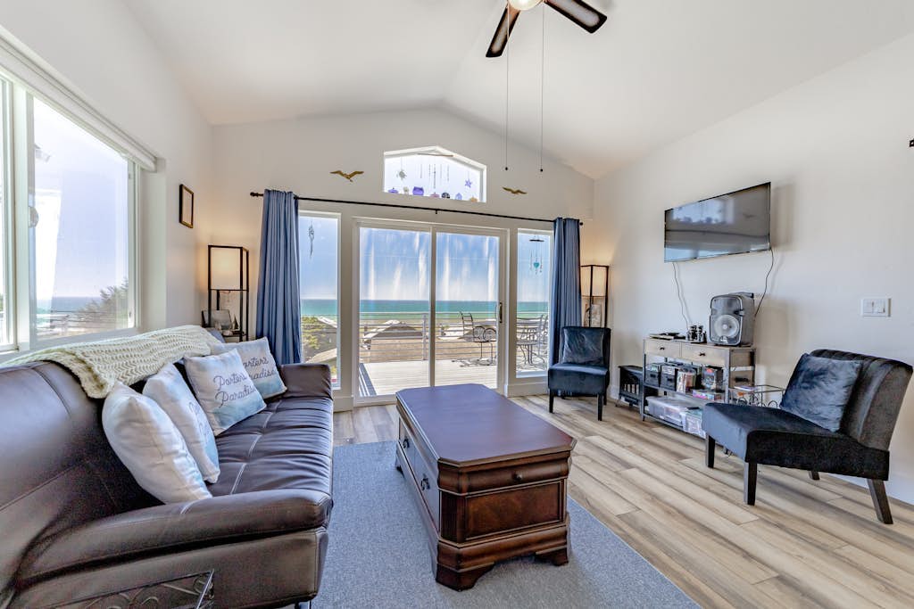Dog-friendly oceanside home w/WiFi, ocean views, private W/D, deck, & fireplace