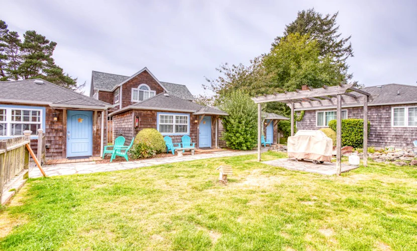 Six Cottages w/ Shared Courtyard & Grill - Two Blocks to Beach Dog-Friendly