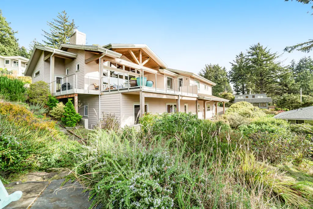 Dog-friendly ocean-view home near the beach with large deck, grill, & Ping-Pong