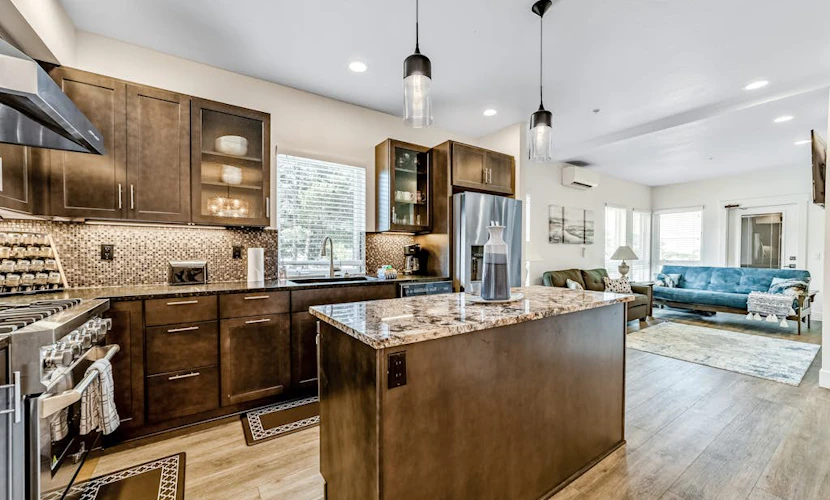 Sunny apt with fireplace, partial water views, washer/dryer, grill & AC