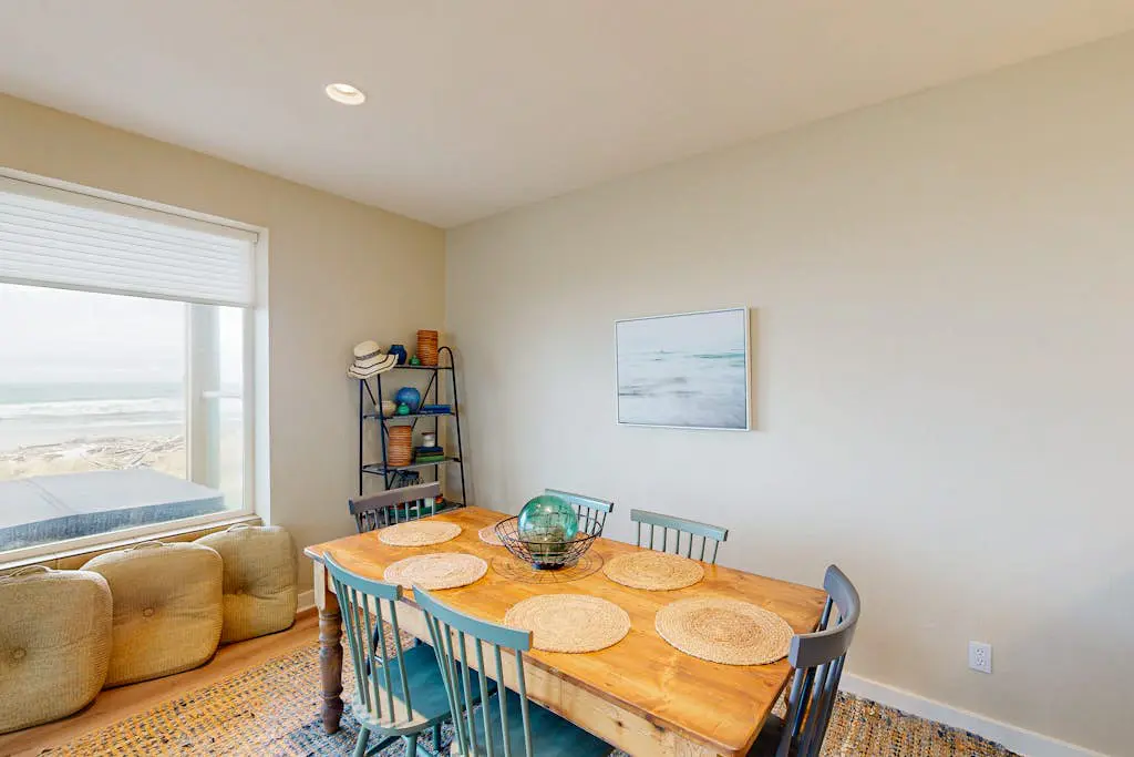Modern oceanfront home with private hot tub, patio, & gas fireplace