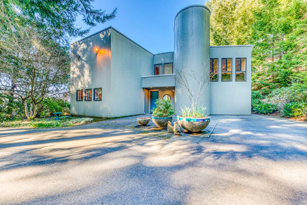Mid-century home with floor-to-ceiling windows & great views