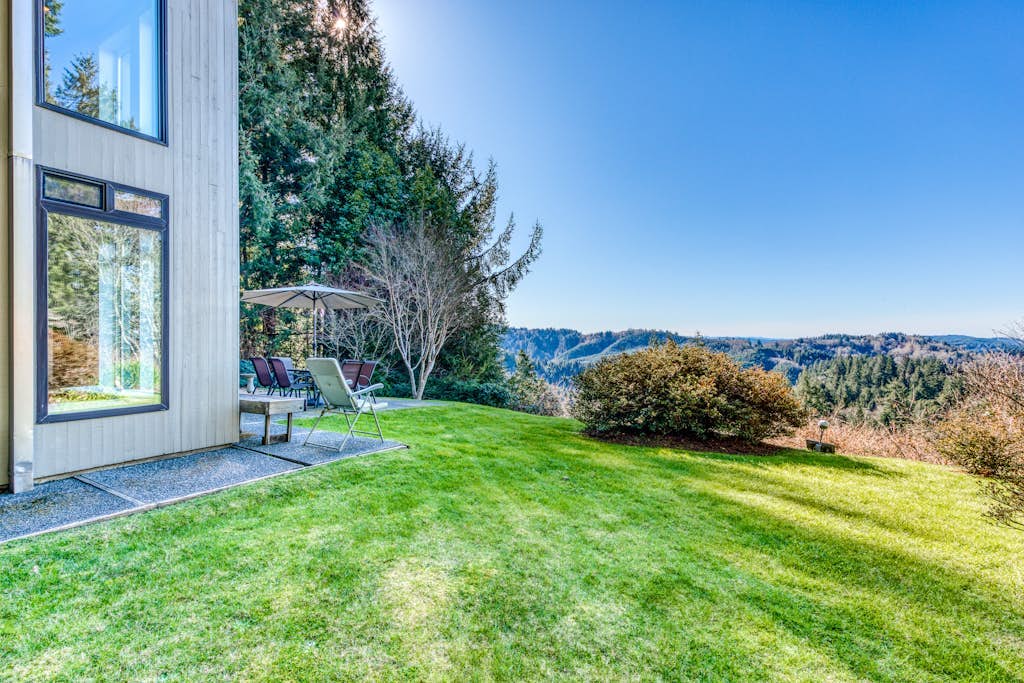Mid-century home with floor-to-ceiling windows & great views