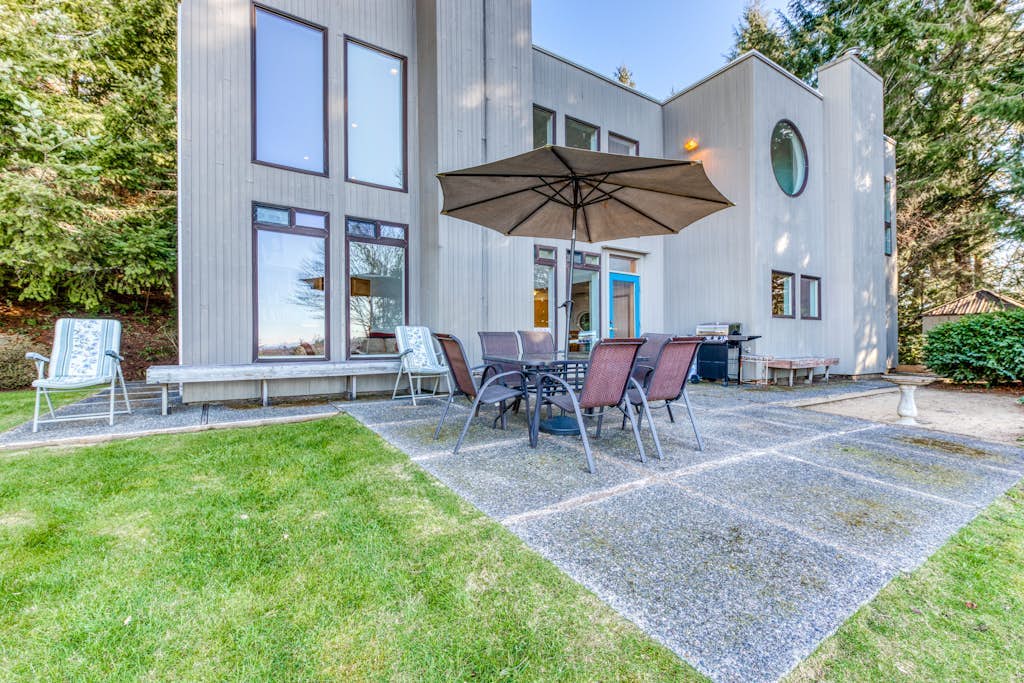 Mid-century home with floor-to-ceiling windows & great views