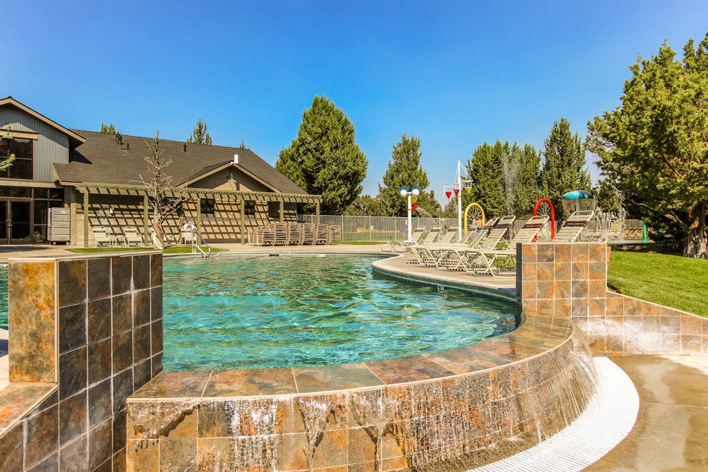 Dog-friendly townhome with mountain views, pools, hot tubs, fitness room, & W/D