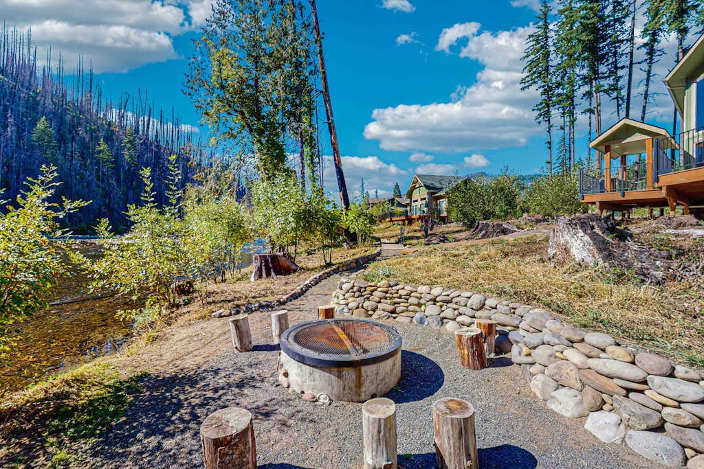 Unique riverfront home + cabin with amazing views, deck, & W/D - dog-friendly