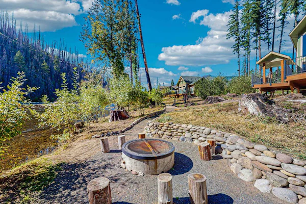 Unique riverfront home + cabin with amazing views, deck, & W/D - dog-friendly