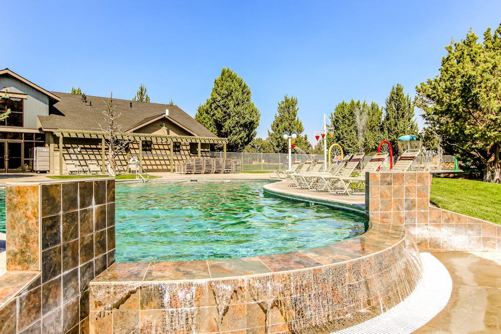 Two-Story Townhouse withFree WiFi, Fireplace, AC, Patio, & Shared Hot Tub, Pools