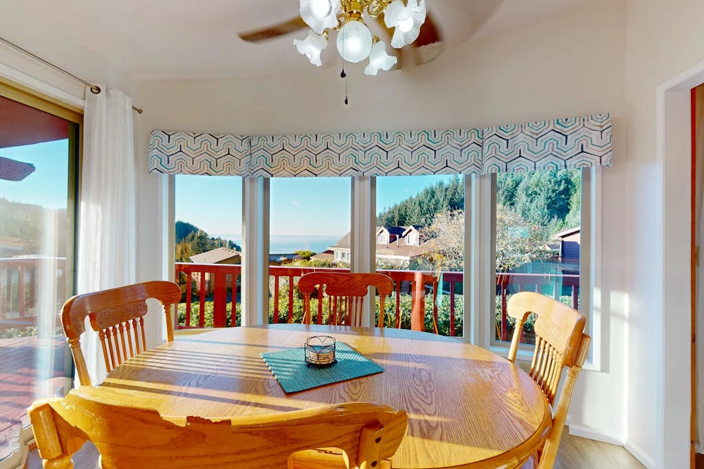Ocean view retreat with nautical interior, grill, games, & AC