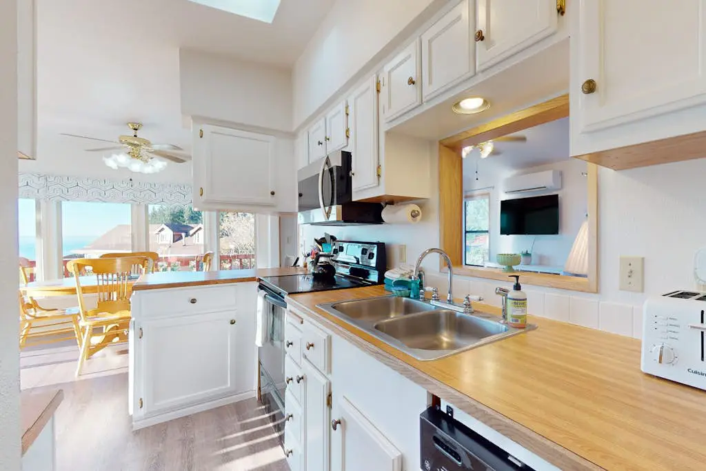 Ocean view retreat with nautical interior, grill, games, & AC