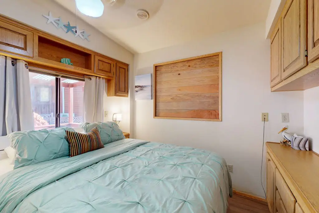 Ocean view retreat with nautical interior, grill, games, & AC