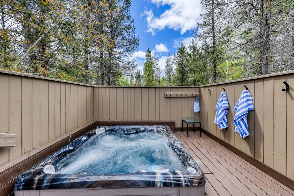 Sunny sanctuary with pool, hot tub, sauna, grill,  fireplace, W&D, and New AC!