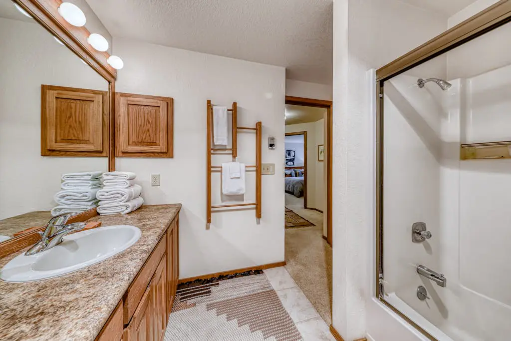 Sunny sanctuary with pool, hot tub, sauna, grill,  fireplace, W&D, and New AC!