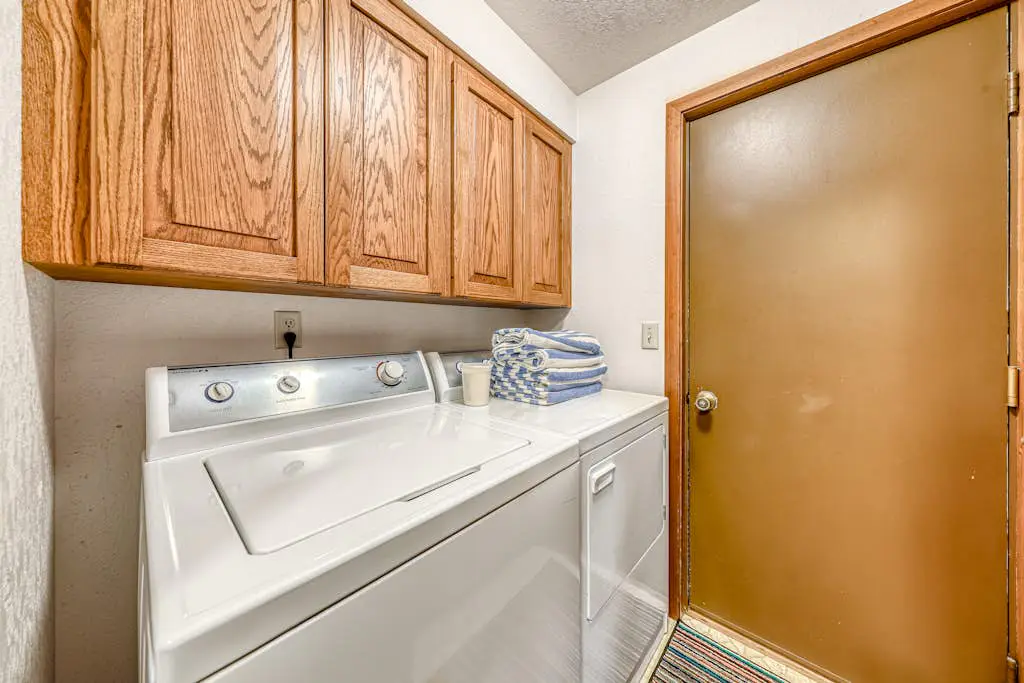 Sunny sanctuary with pool, hot tub, sauna, grill,  fireplace, W&D, and New AC!