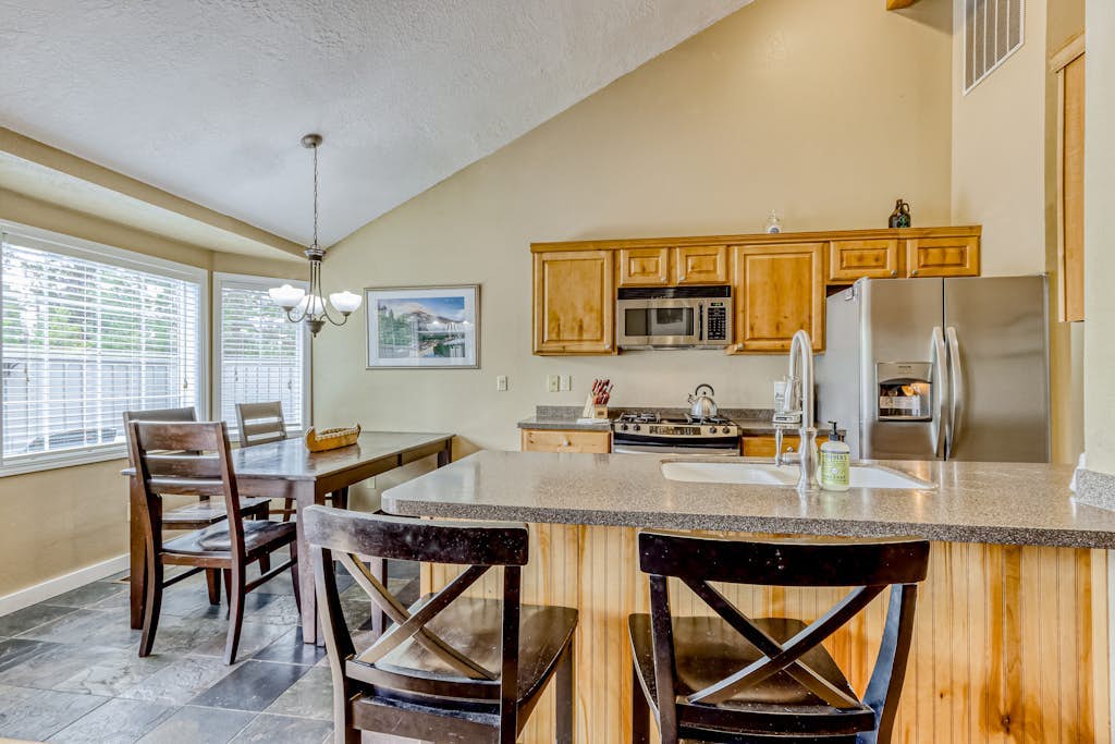 Dog-friendly home with pool & hot tub access, fireplace, bikes, and WiFi