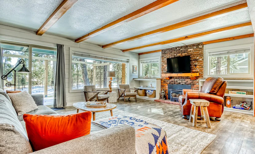 Quaint, riverfront home with woodstove, patio, deck, board games & washer/dryer