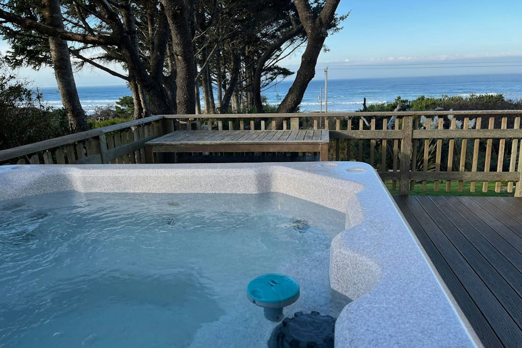 Spacious home with stunning ocean views, hot tub, shuffleboard, air hockey, WiFi