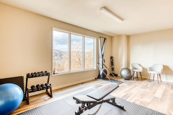 Modern mountain & river-view house with balcony, deck, gym, and WiFi