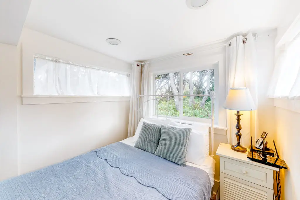 Dog-Friendly Getaway with Outdoor Firepit & Balcony - Steps from Beach Access
