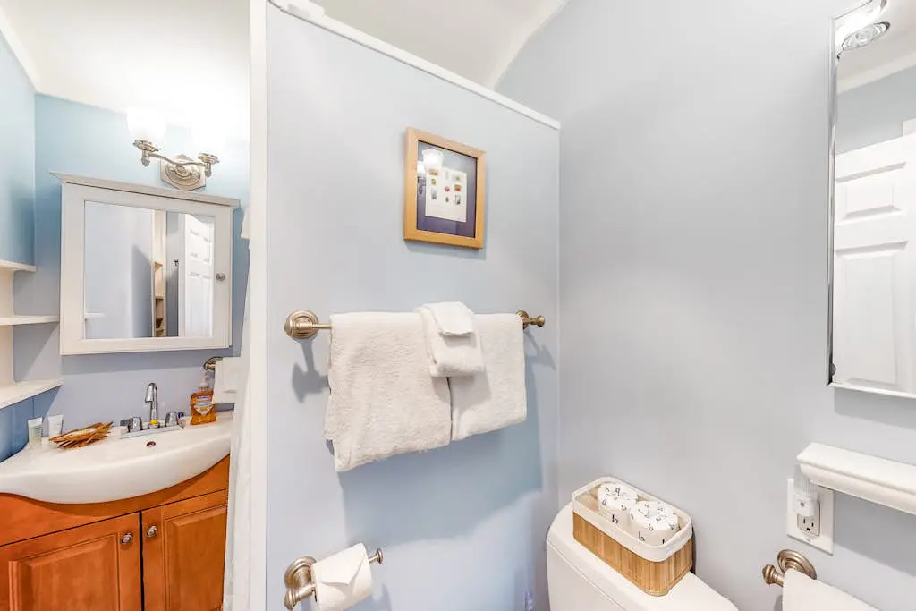 Dog-Friendly Getaway with Outdoor Firepit & Balcony - Steps from Beach Access
