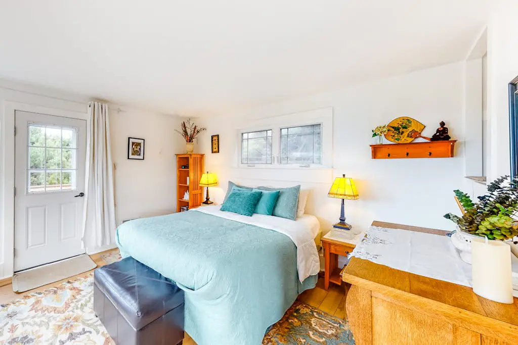 Dog-Friendly Getaway with Outdoor Firepit & Balcony - Steps from Beach Access