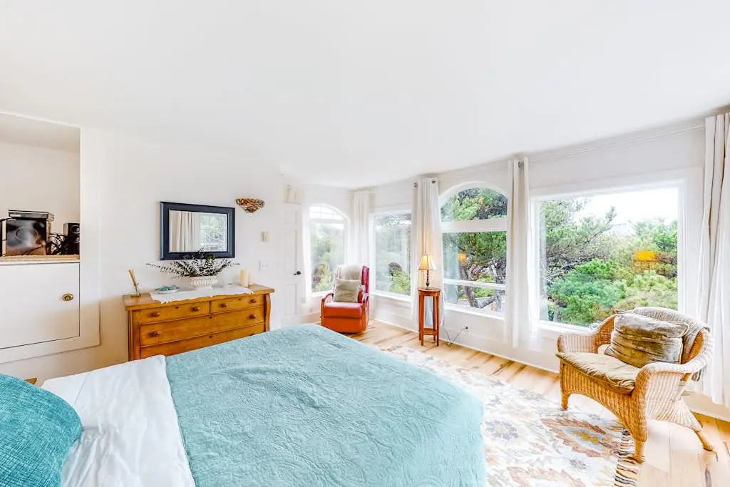 Dog-Friendly Getaway with Outdoor Firepit & Balcony - Steps from Beach Access