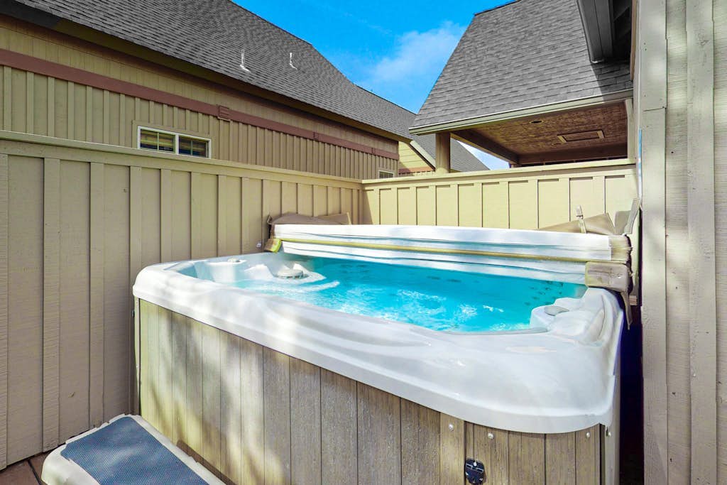 Inviting chalet with private hot tub, grill, 3 pools, hot tub, gym, & tennis