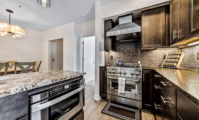 Sunny apartments with fireplace, partial ocean views, washer/dryer, grill & AC