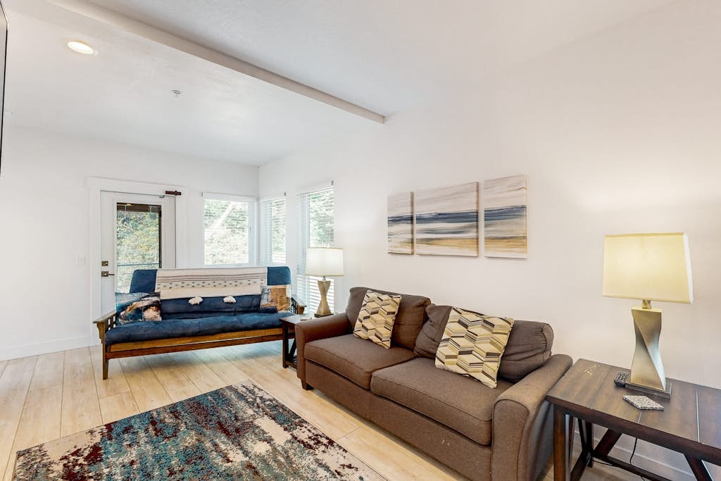 Sunny apartments with fireplace, partial ocean views, washer/dryer, grill & AC