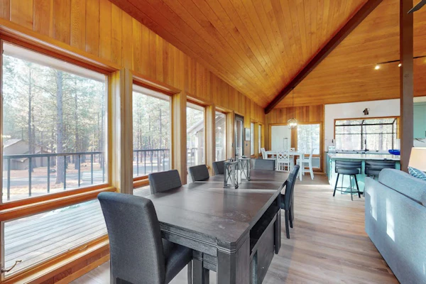 Whimsical tree-lined stay with wood stove, AC, shared amenities, and large deck