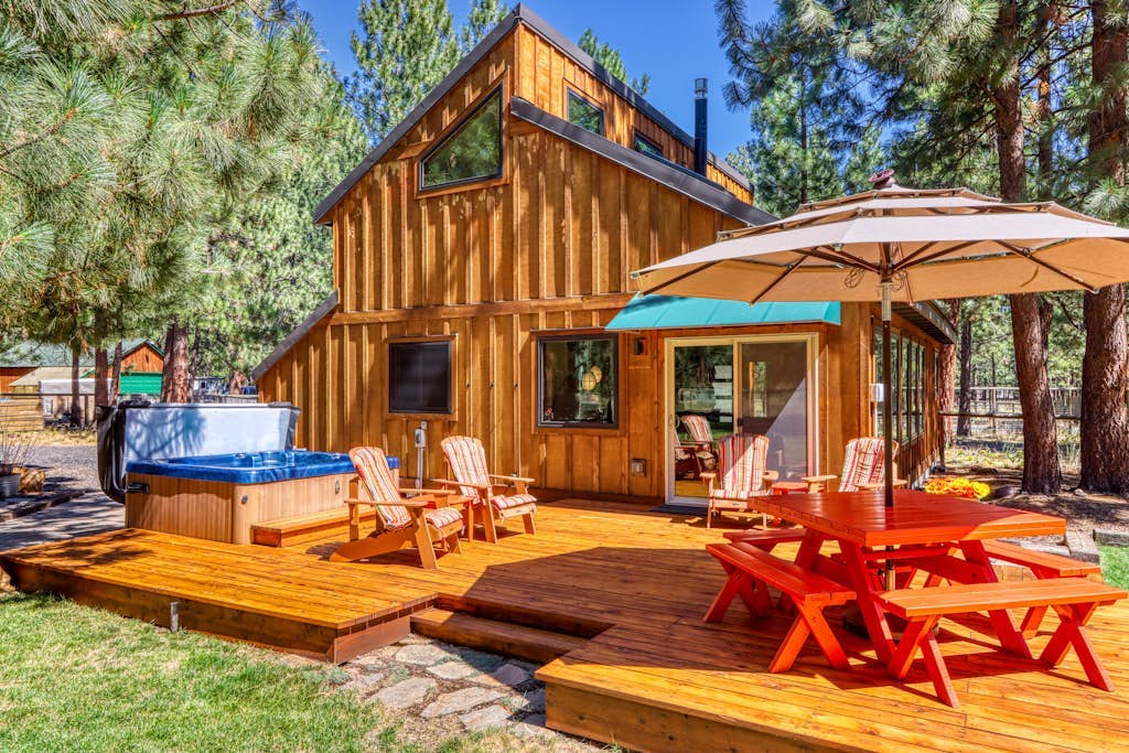 Home with a private hot tub, shared pool, & National Forest at your backdoor