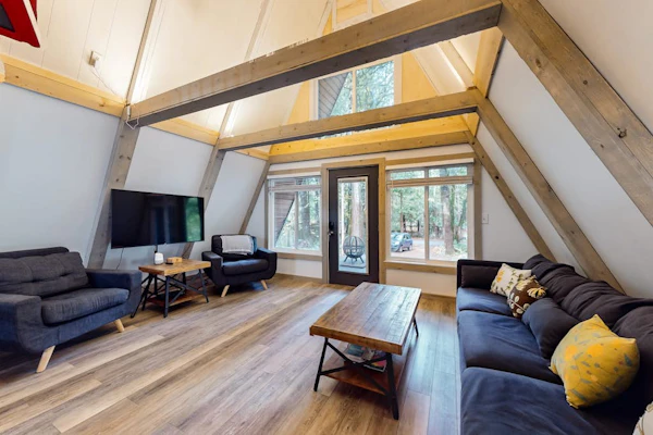 Dog-friendly A-frame near the river with game room, firepit, wood stove, & grill