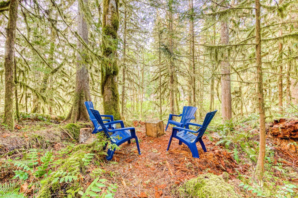 Woodland home near golf & ski slopes with wraparound deck - dog-friendly