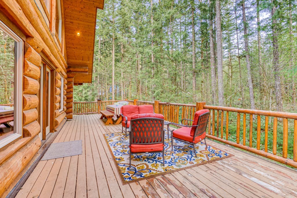 Woodland home near golf & ski slopes with wraparound deck - dog-friendly